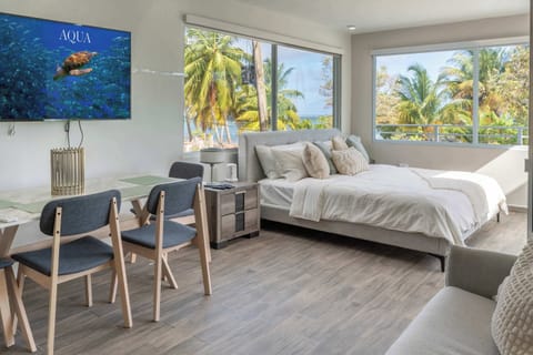 Studio with king bed, dining / work area