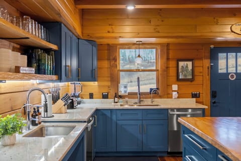 Large group kitchen designed for big family dinners. Two sinks and two dishwashers keep cleanup fast.