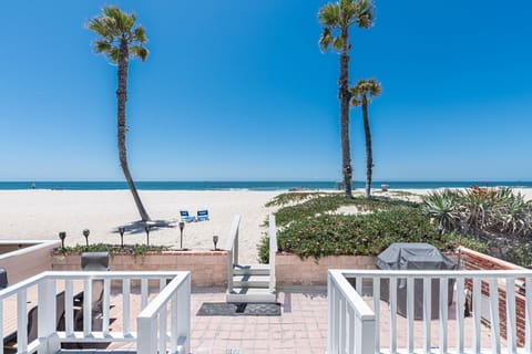 The outside patio, complete with a propane grill and a dining table for six.
                