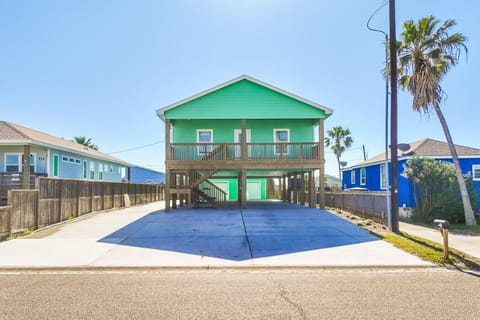 `Colorful beach house with cozy interior vibes – your perfect getaway spot!`