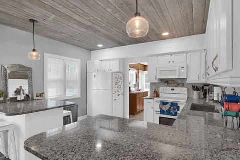 A view of the kitchen to the laundry room
