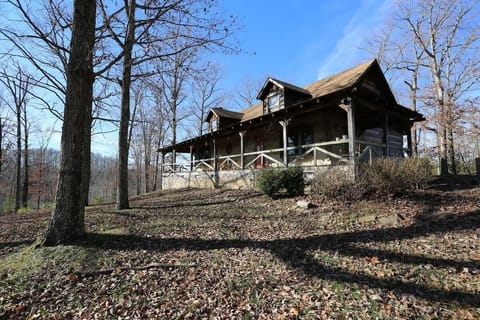 Hand-hewn wooden structure. Isolated with gorgeous view of forest and lake.