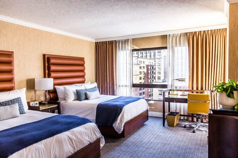 Bright, comfortable space with two beds, offering a harmonious blend of convenience and style.