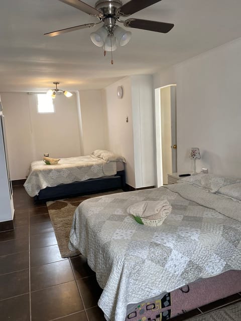 Master Bedroom with two Full beds 