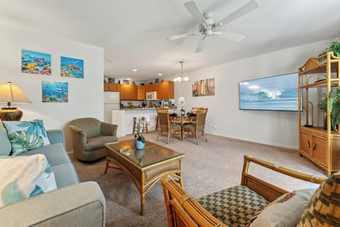 Wall mounted flat-screen TV with cable