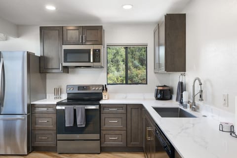 Take in the inviting kitchen view, thoughtfully designed for cozy, homey meals