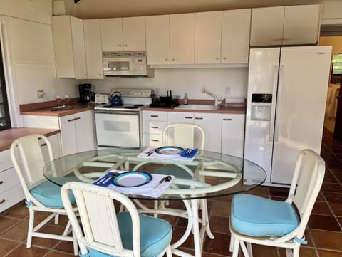 Kitchen, living & entry on upper level with bedroom 2, 3 and shared bathroom