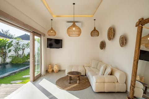 Indoor Comfort Meets Garden Serenity in a Stylish Living Space.