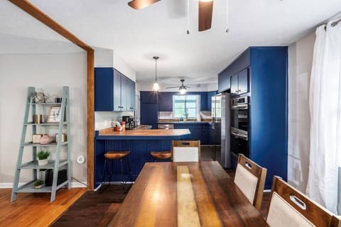 Dining room table seats at least 6 people. 2 stools at the bar. Full kitchen with stainless steel appliances.