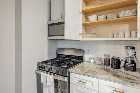 Fully stocked kitchen with counter height seating