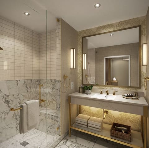 Refresh at a spa-like vanity with elegant gold accents.