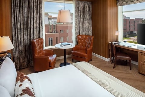 Relax by the window with comfortable seating and desk space.