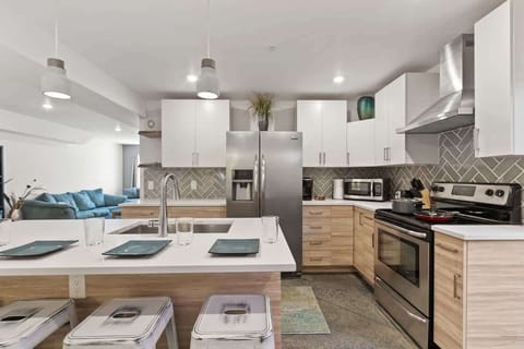 Kitchen with cookware and dining space