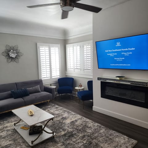 Overview of Living room with fireplace and smart tv