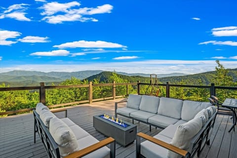 Gather around the fire table as endless layers of Smoky Mountain ridges stretch across the horizon. This expansive deck was made for morning coffee, sunset conversations, and unforgettable evenings under the stars.