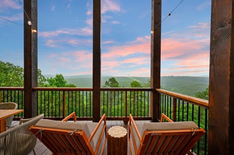 It doesn’t get much better than unwinding in a rocking chair with peaceful views of the mountains and forest all around.