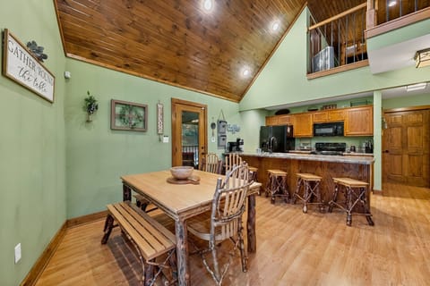 Open floor plan to kitchen and dining room.