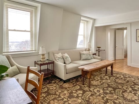 Light-filled living room with views of S. Main St. and Seneca Lake