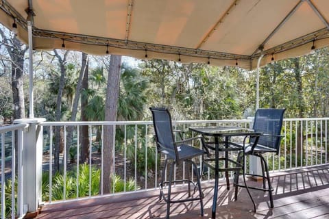 Relax on your private covered balcony surrounded by lush tropical foliage, perfect for morning coffee or evening wind-down.