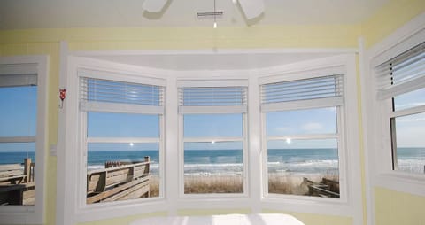 With TV, and stairs down to a full bathroom.