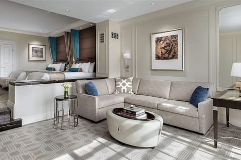 Relax on the sectional with a glimpse into the bedroom.