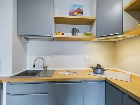 Kitchenette with an oven.