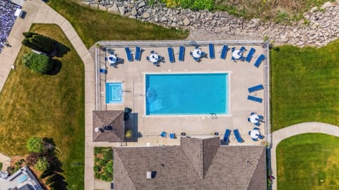 Aerial view of the community pool just 3 houses away from the home!