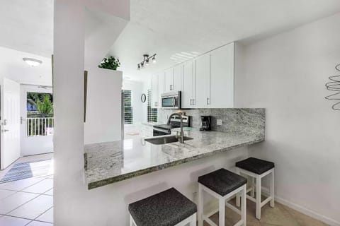 Kitchen featuring updated stainless steel appliances