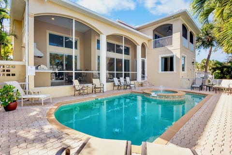 Private heated pool with spacious covered patio