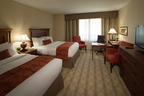 Unit with 2 Queen beds. Exact unit will be assigned upon arrival. Views, colors, and decor may vary.