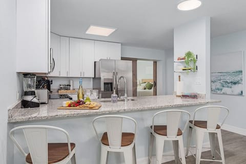 Pull up a chair and chat with the chef in this modern kitchen