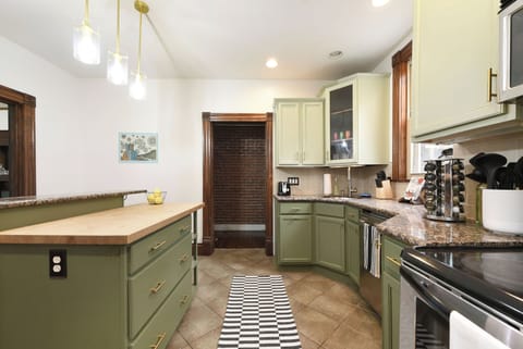 Kitchen with kitchen island and lime green interior
