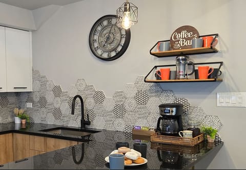 Kickstart your day with a cup of coffee or tea! The cabin has a French press and drip coffee machine, along with complimentary coffee, tea, and sweeteners