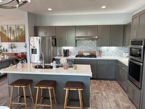 Gourmet kitchen comes with everything you’ll need for your monthly stay