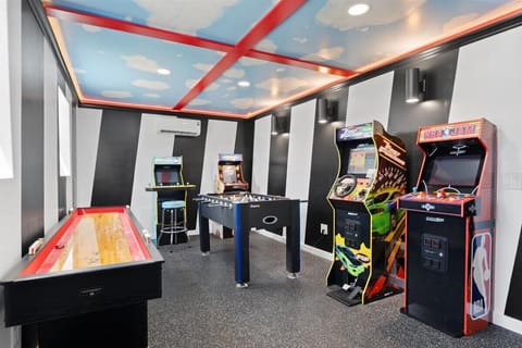 Game Room with Air Hockey, Foosball, NBA Hoops and other arcade games.