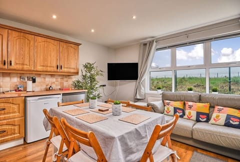 Serve your delicious meals easily at the lovely dining area.