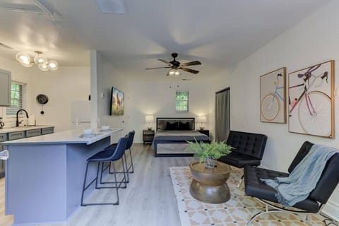 Experience studio living at its finest—cook a quick meal at the breakfast bar before sinking into plush bedding, all while remaining connected in this thoughtfully designed space.