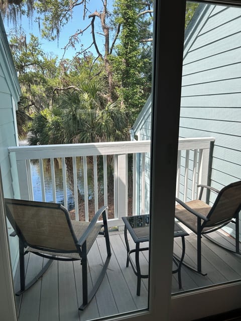 Balcony in master bedroom over looking lagoon.