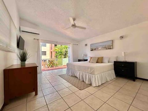 The large windows let in ample natural light during the day, while blackout curtains ensure a peaceful sleep at night.