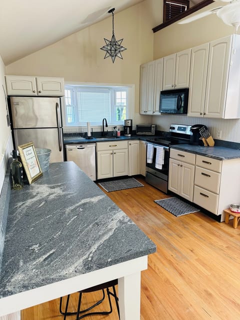 Brand new gorgeous kitchen counters and newly added beverage bar with fridge.
