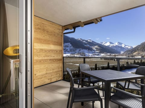 Sky, Property, Building, Furniture, Table, Shade, Wood, Architecture, Mountain, Snow