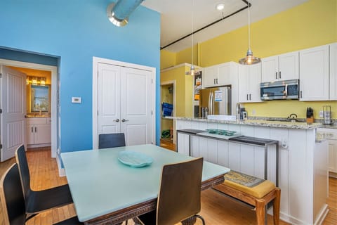 Gather Around the Dining Table at The Sunrise Loft - The Perfect Place to Reconnect with Loved Ones