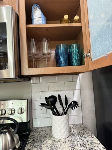 Kitchen complete with cookware and hot water kettle