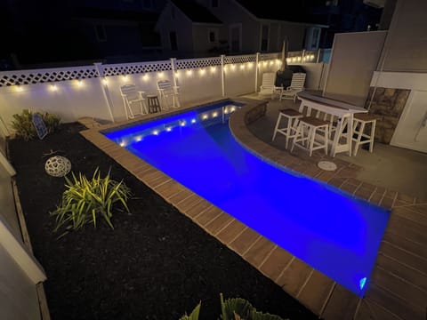 LED pool light and string lights make for the perfect nighttime pool parties. 