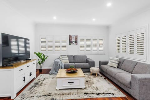 The living area boasts sweeping windows with plantation shutters so you can enjoy privacy and a shaded rest. 