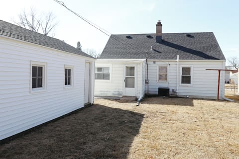 Backyard with garage. 