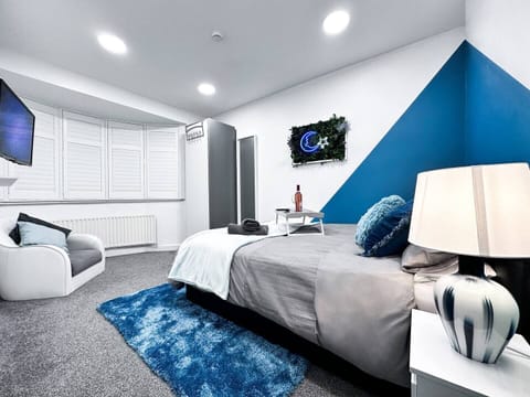 Master Bedroom. Features a 'King' size bed and a 'Love' seat.