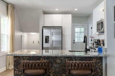 Sipping morning coffee in style with these chic marble vibes in the kitchen! ☕ #MarbleMagic