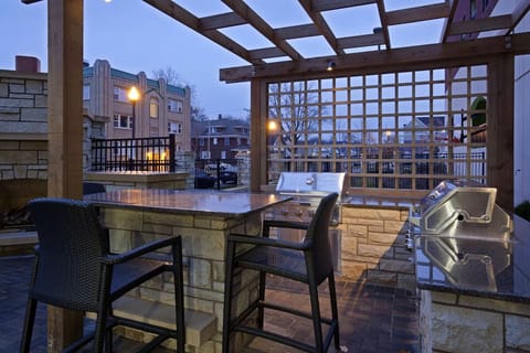 Savor sunset BBQs at the outdoor grill and bar seating.