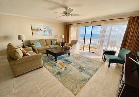 Large, inviting living room, with a great view and cross breeze. Brand new 75 inch Samsung HD TV with Internet apps. Great selection of DVDs as well in case of rain.
